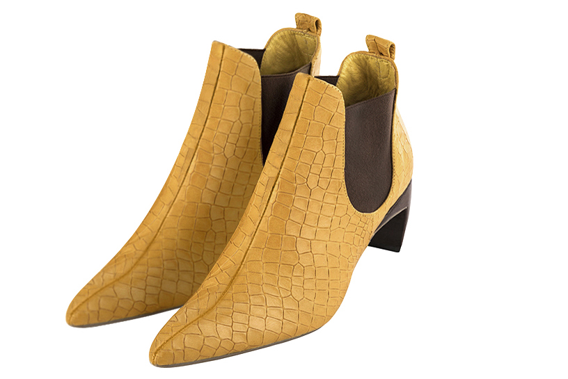 Mustard yellow and dark brown women's ankle boots, with elastics. Tapered toe. Medium comma heels. Front view - Florence KOOIJMAN